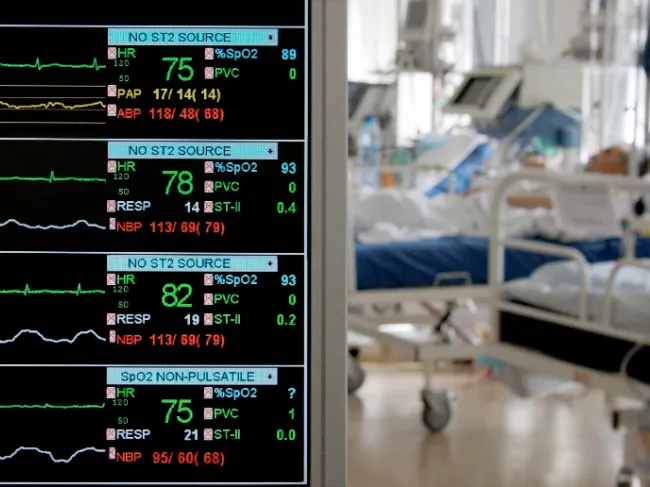 patient in ICU with monitors